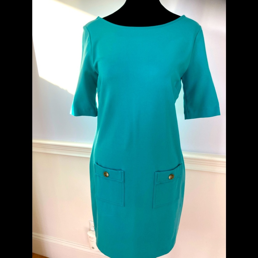Teal classic dress with lots of style. Beautiful fabric.